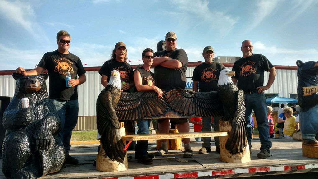 Chainsaw carver team in north dakota