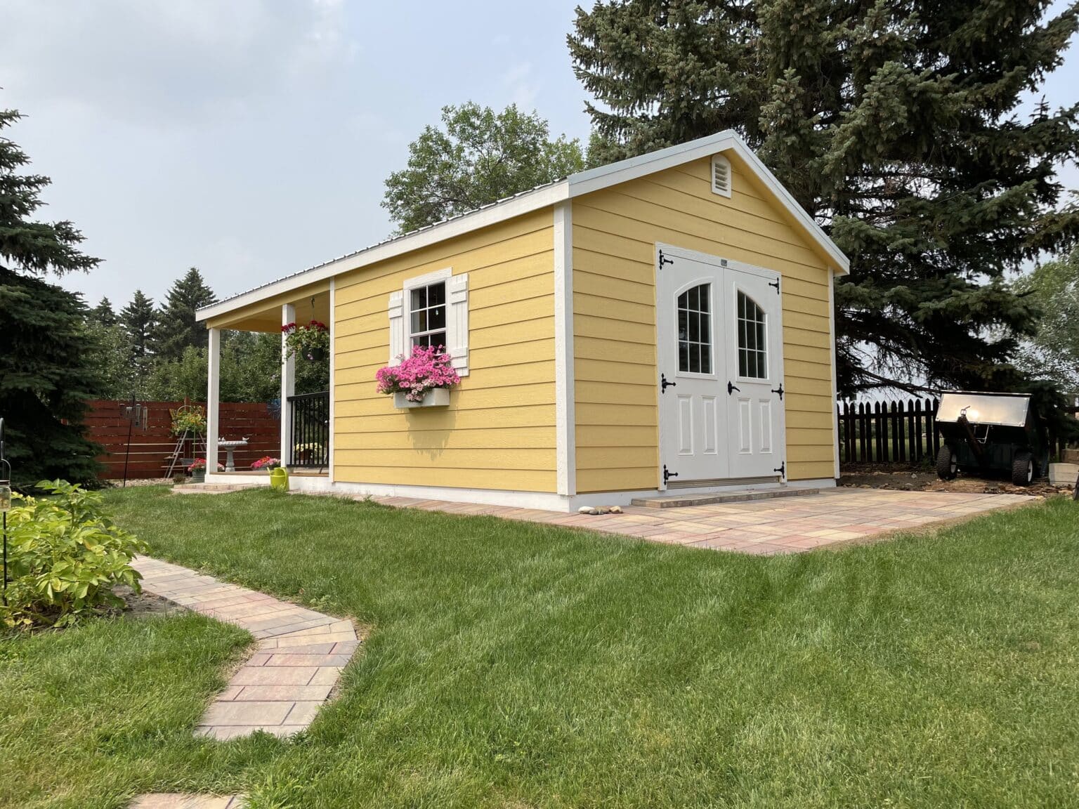 12x24 Ranch Cottage Shed with rear doors and back patio