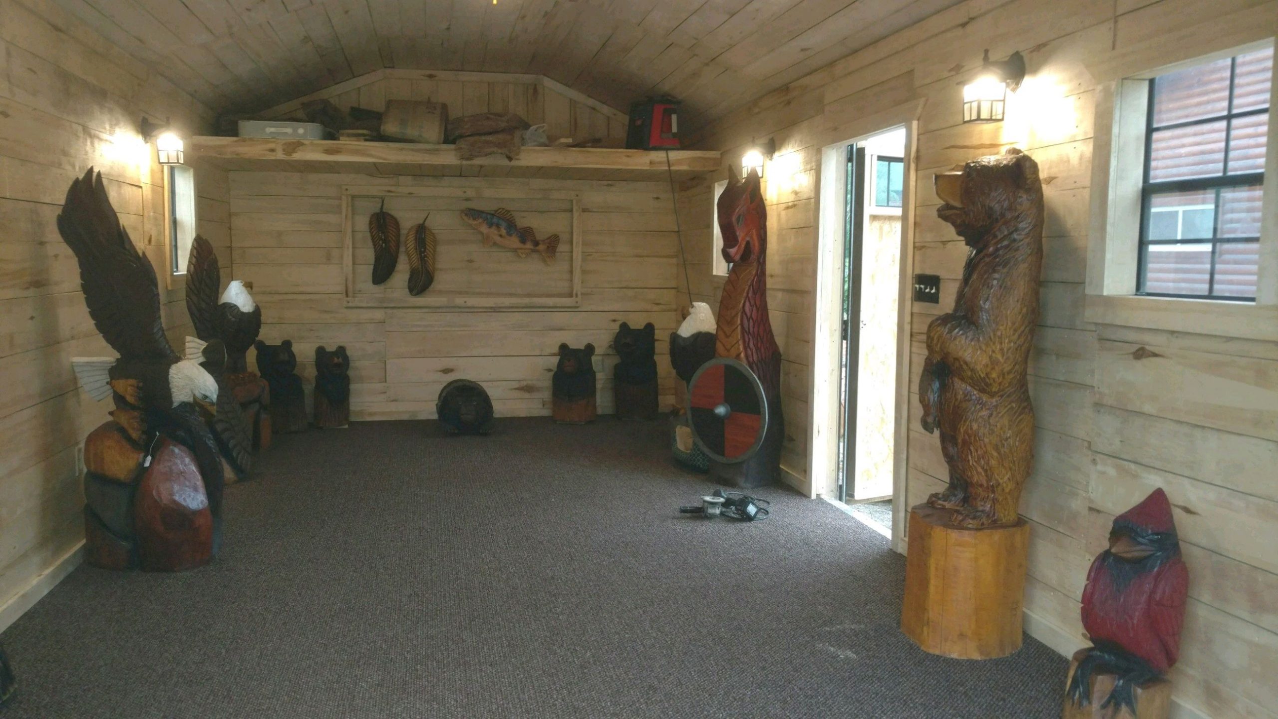 Chainsaw carving studio shed